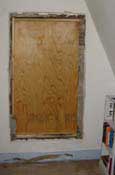 boarded up window