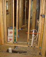 roughed in bathroom plumbing